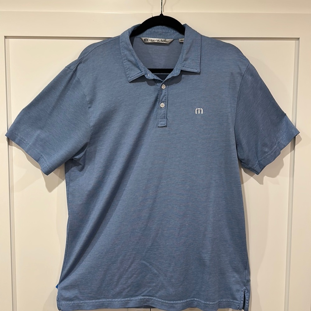 Travis Mathew light blue golf polo. Size large.